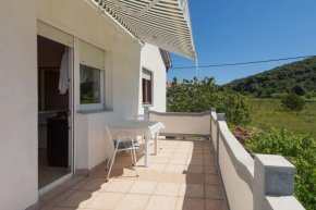 Apartments Petar - garden with BBQ